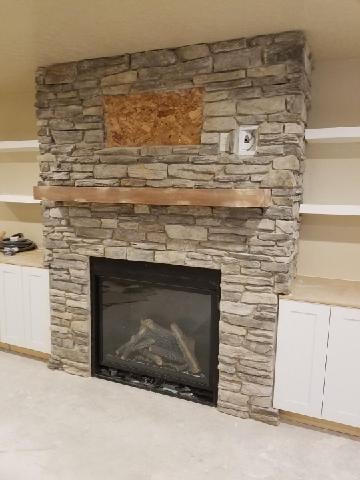 Large-Faced Fireplace w/ Stone Surround & Mantel in Idaho